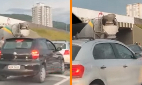 Motorista não respeita sinalização e caminhão fica preso em viaduto