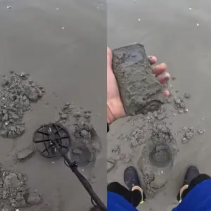 Jovem encontra celular enterrado em praia e devolve à proprietária