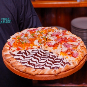 FOTOS NO AR | Nova unidade da Pizza Garden é inaugurada com casa cheia e celebração em Nova Trento